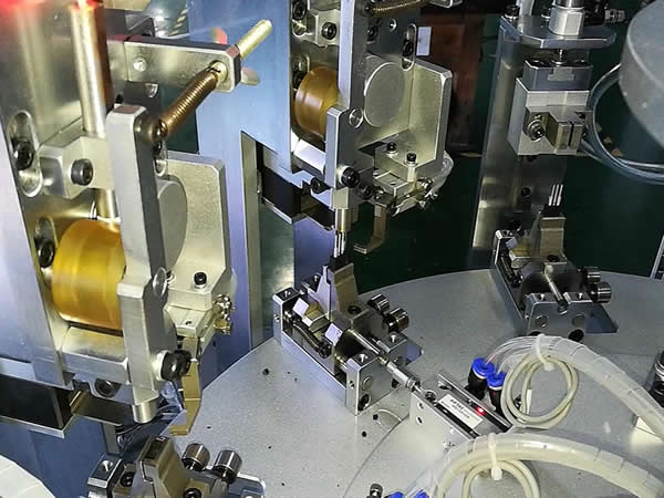 Tube inserting and pressing work station